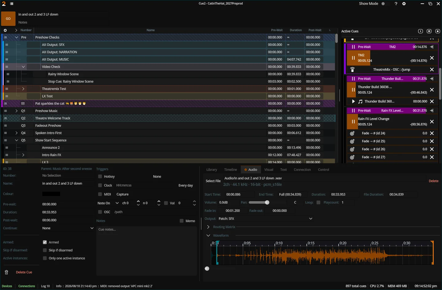 Cue2 showing a theatre cuelist, active cues, and an audio waveform